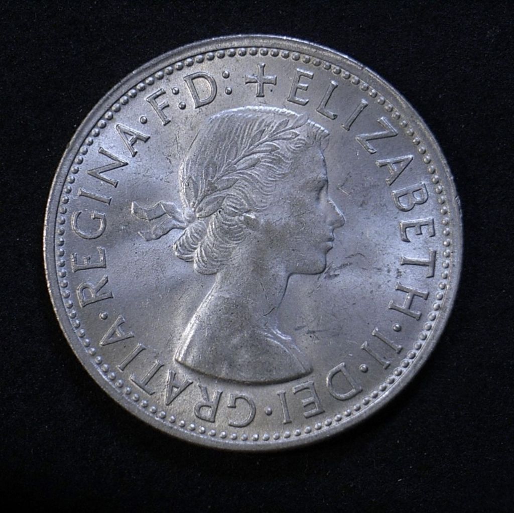 Close up of 1958 florin obverse highlighting the coin's detail using another light angle
