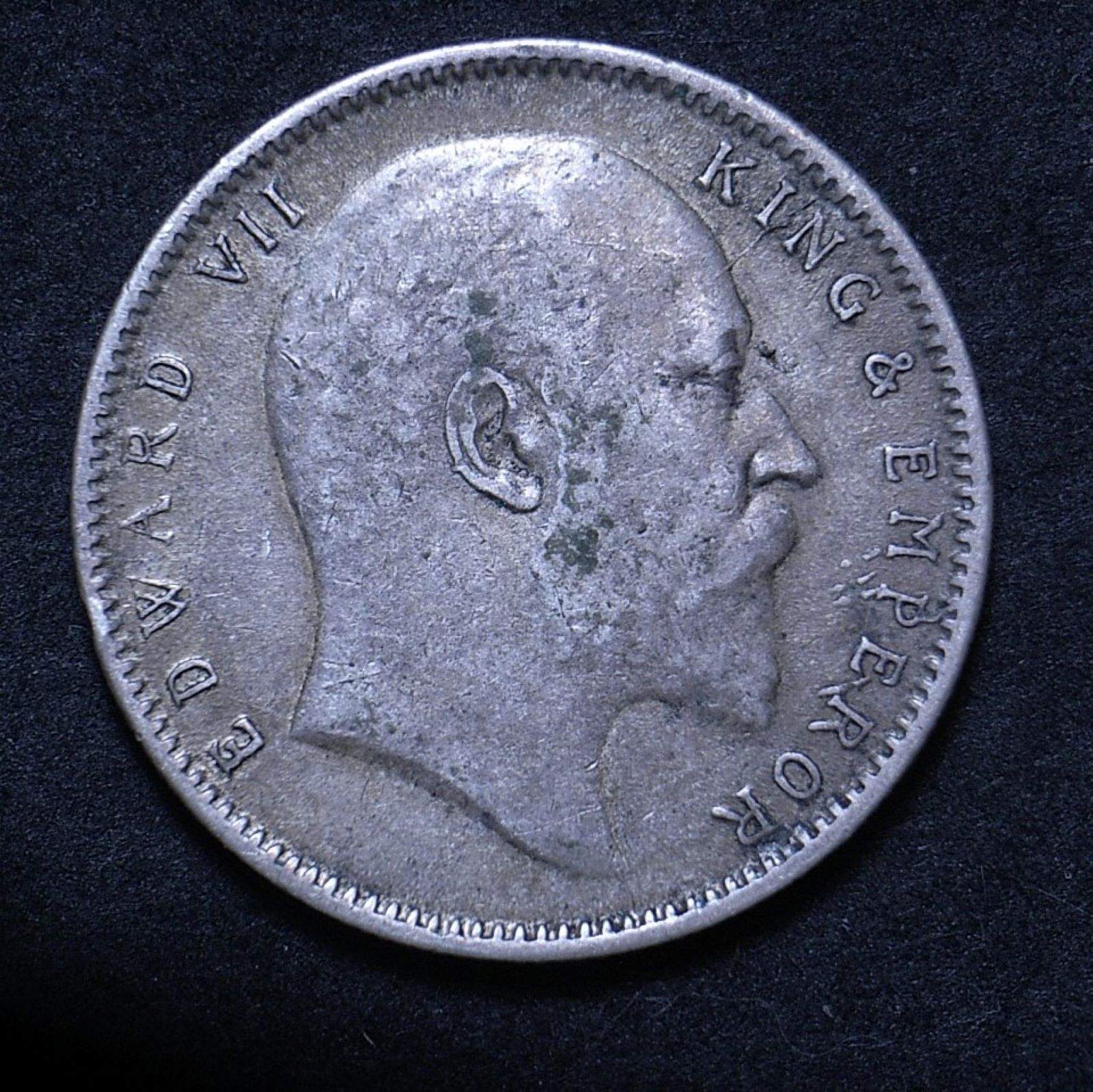 Close up of 1904 Indian rupee showing the coin's detail
